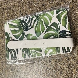 Luggage tag new still in plastic packaging